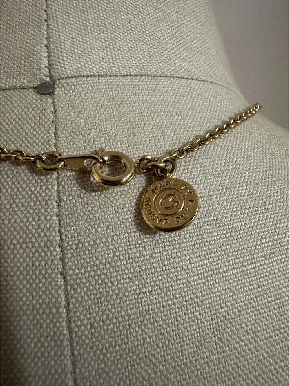MARC BY MARC JACOBS Gold and Black Round Pendant Locket